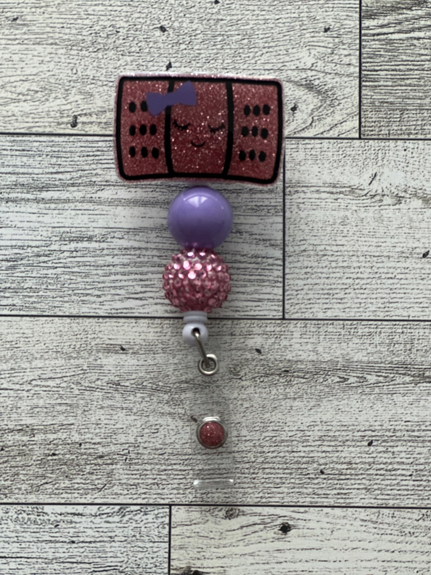 Bandaid Badge Reel