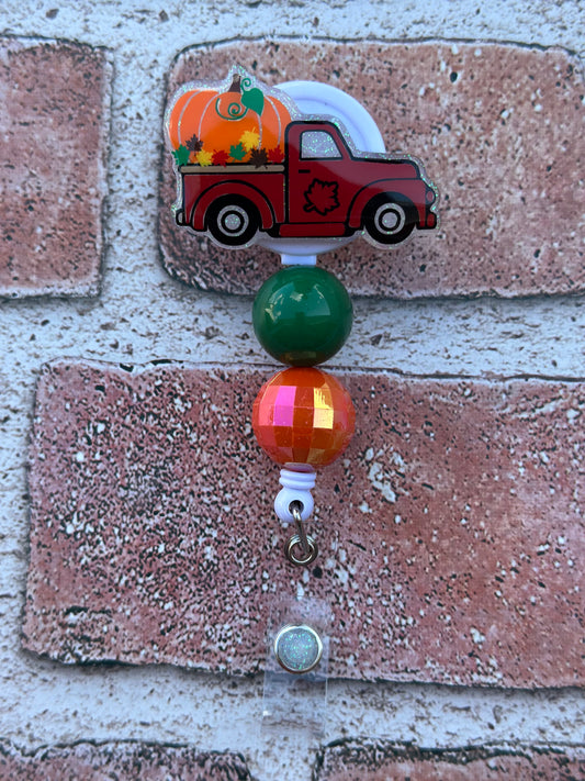 Fall Truck Badge Reel