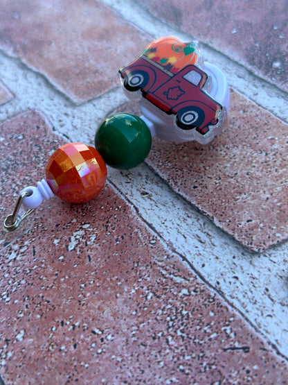 Fall Truck Badge Reel