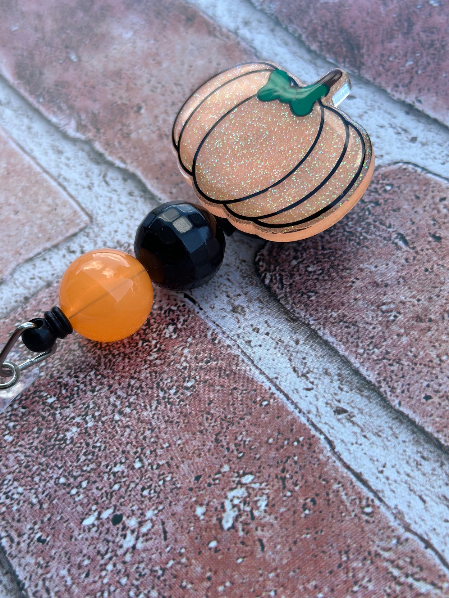 Pumpkin Badge Reel